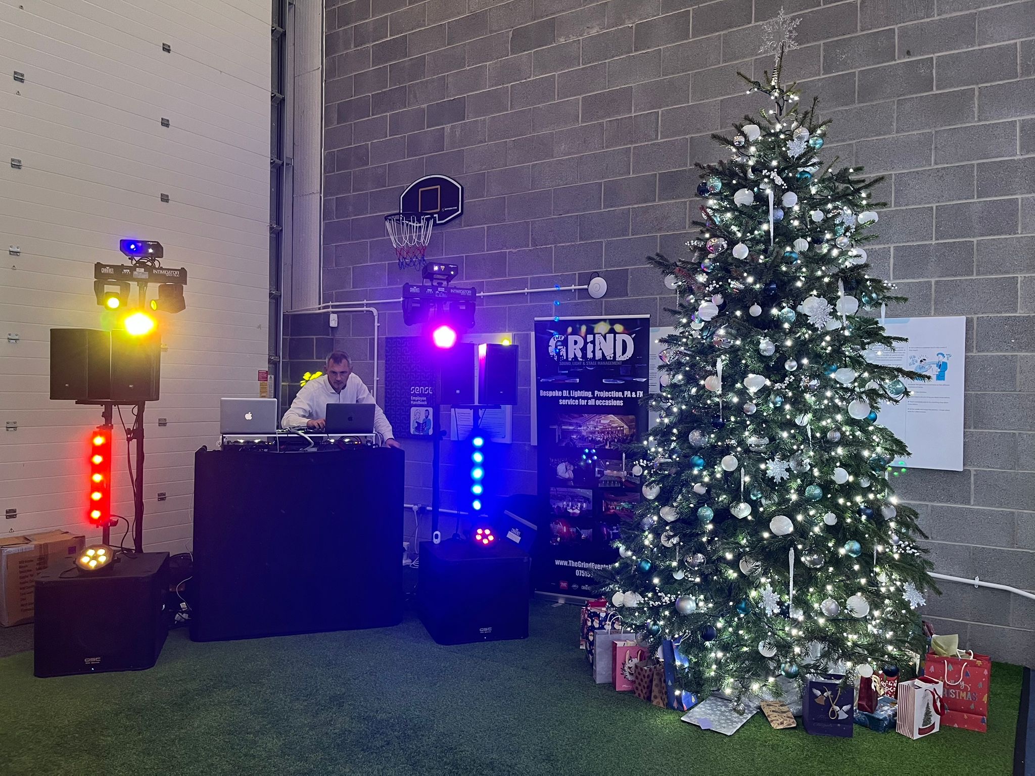 DJ booth and lighting setup for wedding reception